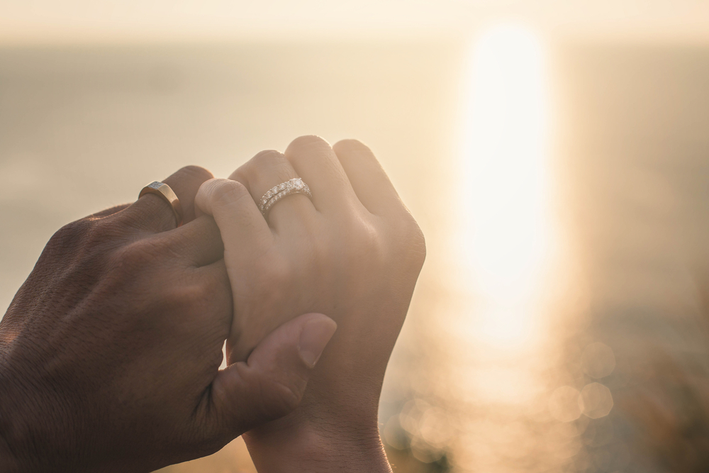 Couple holding hands